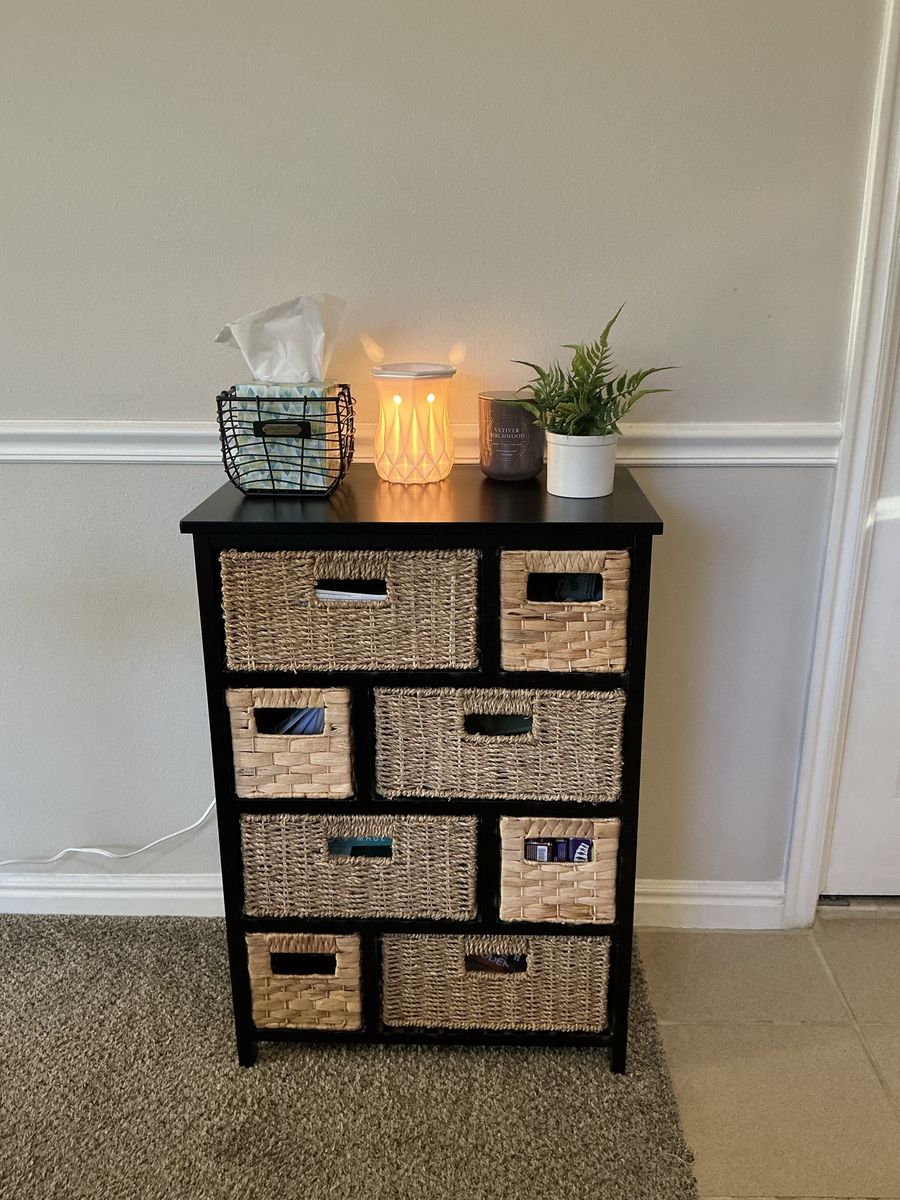 Black Storage Cabinet with Woven Wicker Baskets