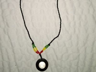 Vintage Beaded Rasta Color Pendant Necklace with Ring Shell Inlay Centerpiece