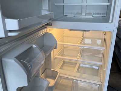 White Top Freezer Refrigerator works great its plug in for u to see $120