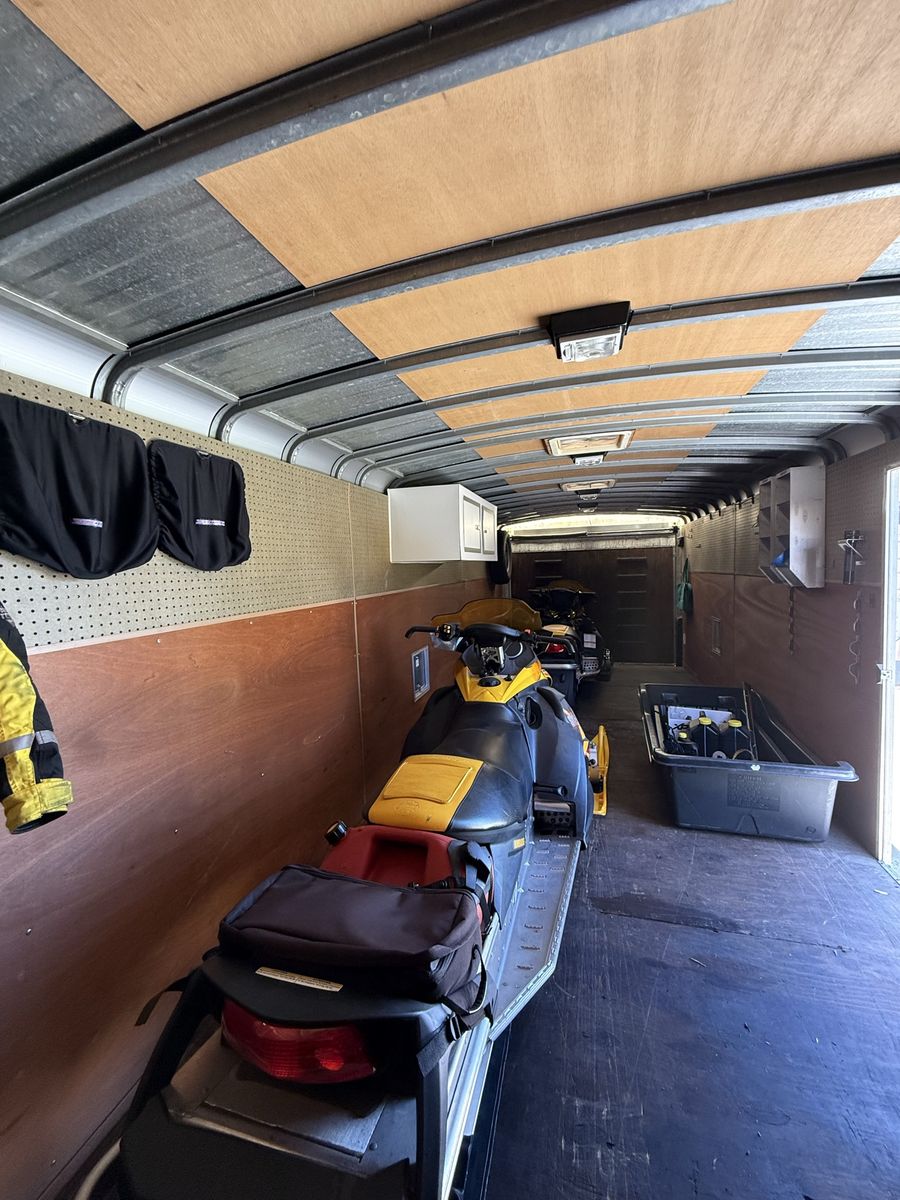 Snowmobile trailer and sleds