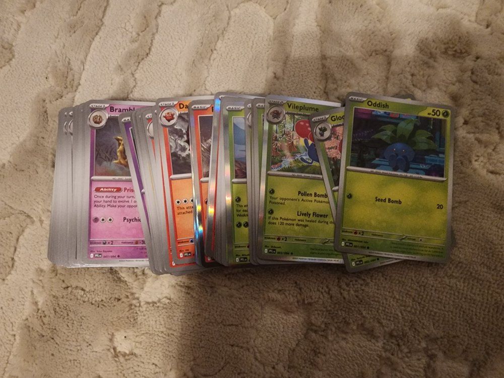 Pokemon Cards from the Phantasmal Flames base set - 84/94 cards with no duplicates.