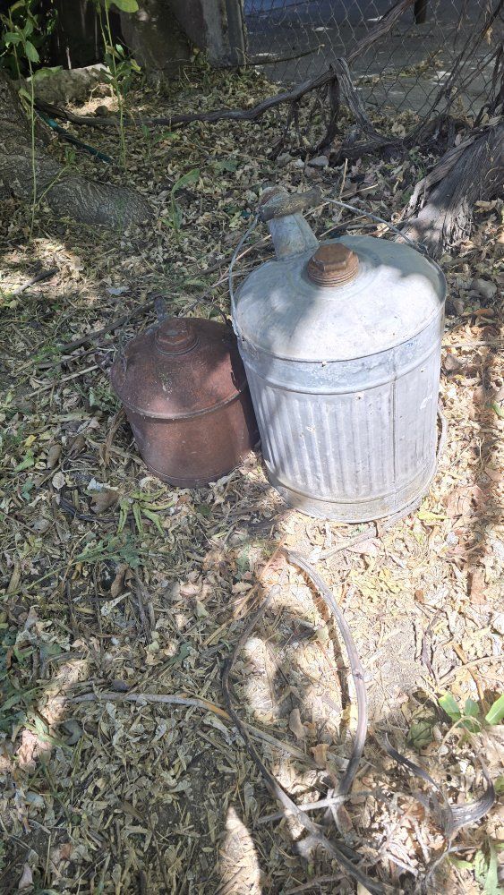 Antique oil cans