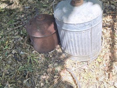 Antique oil cans