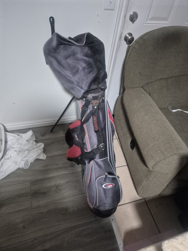 golf clubs and balls