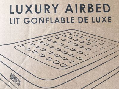 New self inflating bed air mattress California king new in box