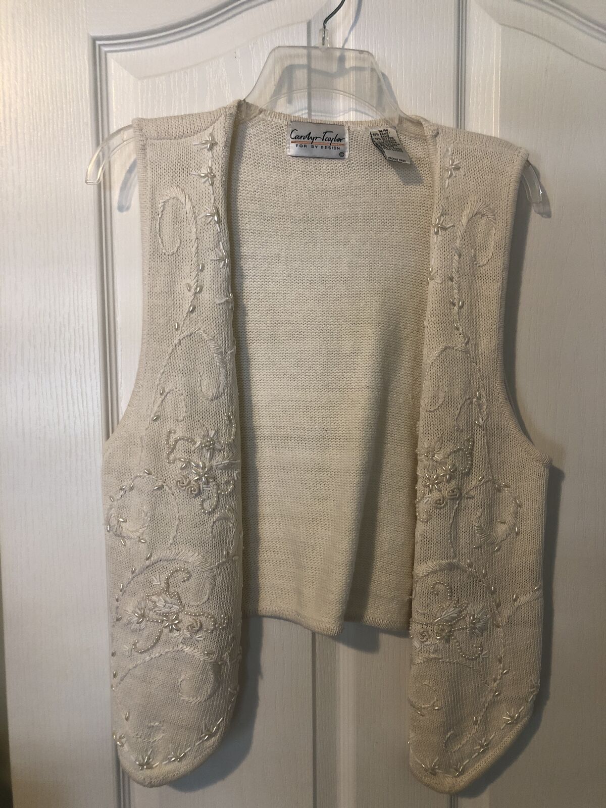 Carolyn Taylor beige vest featuring delicate pearl accents and embroidered detailing