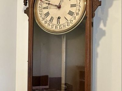 Antique early 1900’s calendar wall clock walnut