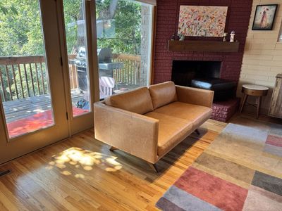 Mid-Century Modern Tan Leather Loveseat / Sofa with Wooden Legs from West Elm