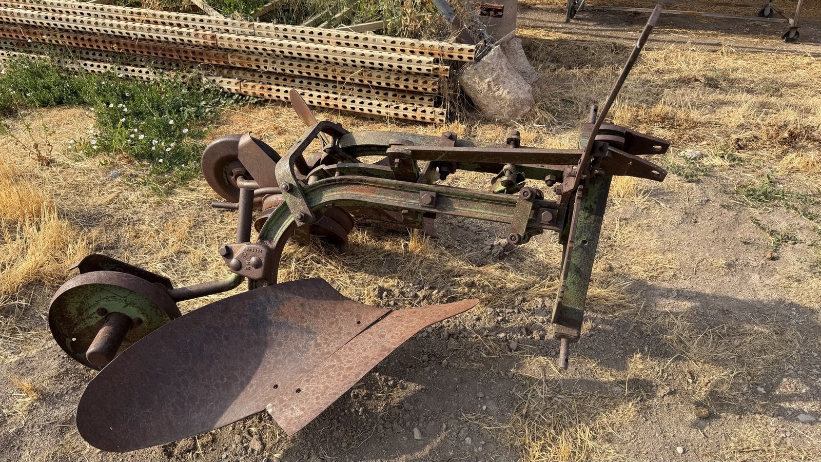 JD single bottom roll over plow
