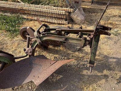 JD single bottom roll over plow
