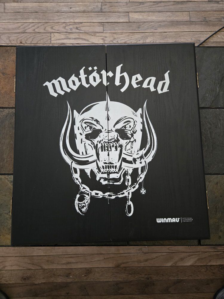 Dart board cabinet with Motorhead logo