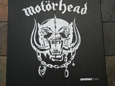Dart board cabinet with Motorhead logo