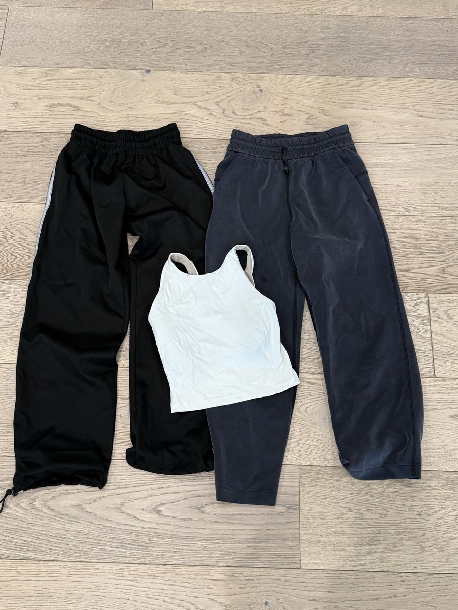 Lululemon size 2 dark blue suede yoga pants, white tank and FIVE black athletic pants size YL