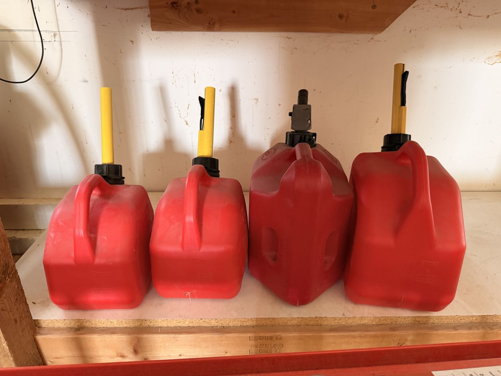 Set of 4 Red Plastic Gas Cans with Spouts