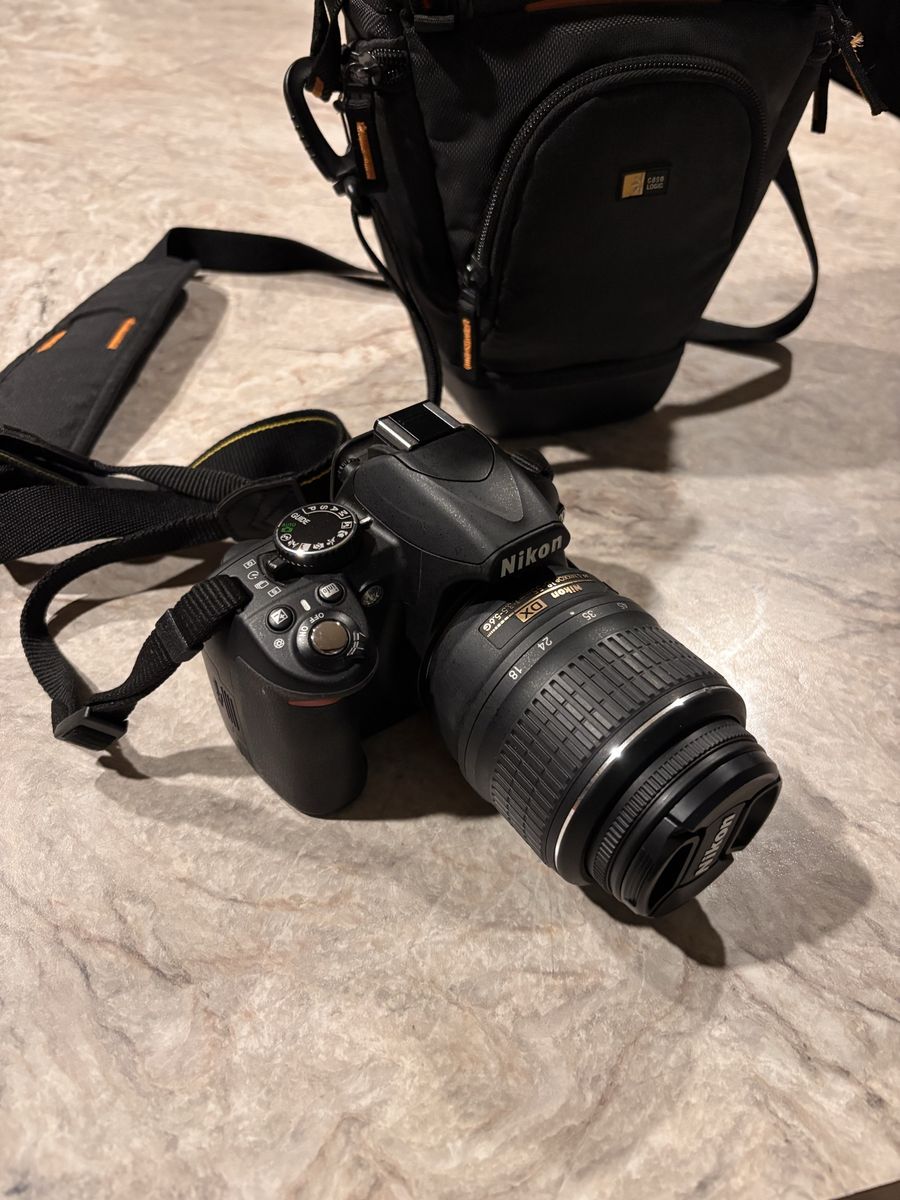 Nikon D3100 DSLR Camera with 18-55mm VR Lens and Case