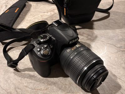 Nikon D3100 DSLR Camera with 18-55mm VR Lens and Case