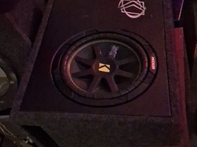 kicker subwoofer in truck box & new amp