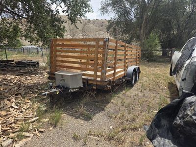 Big Tex Tandem Axle Utility Trailer with Wooden Stake Sides and Toolbox