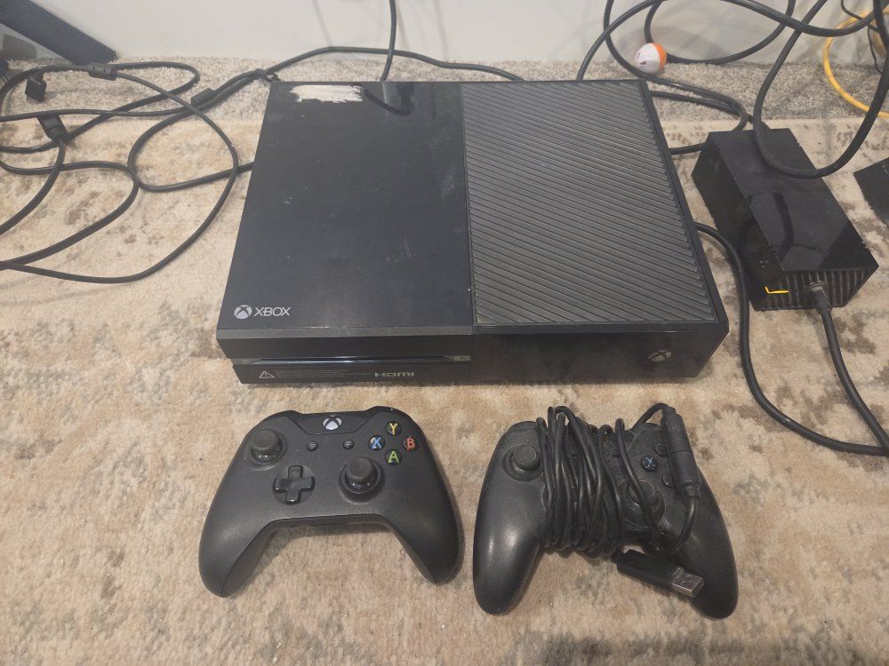 Xbox One w/ controllers and games