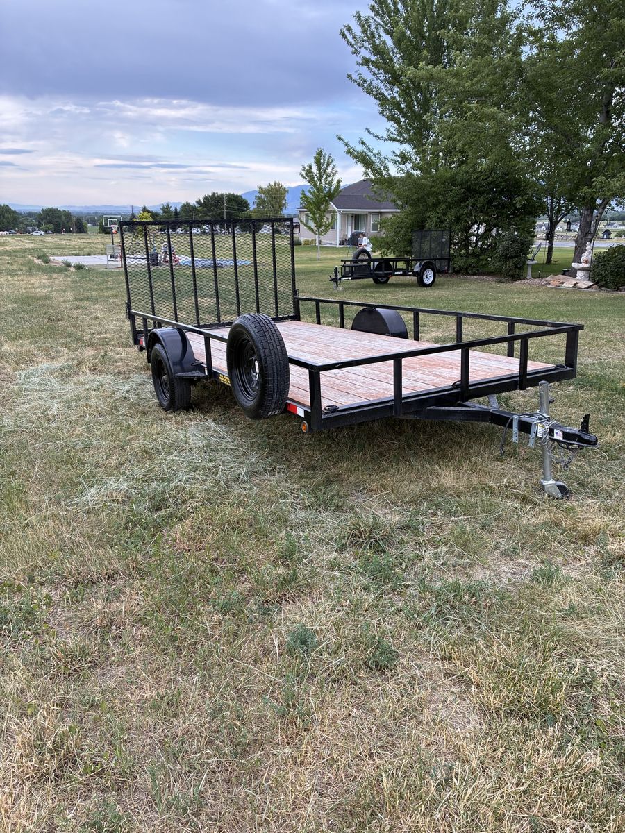 Big Bubba’s deluxe model Utility Trailer, Wood Deck, Steel Frame, Black, Excellent Condition 7 x 14 ft