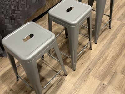 Three Grey Metal Bar Stools