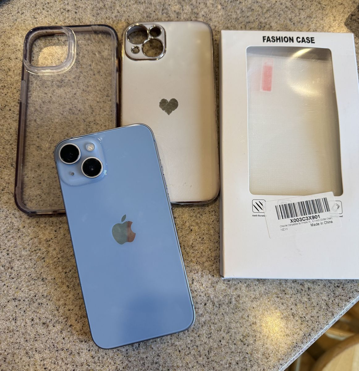 Unlicked iPhone 14 with 3 screen protectors, 4 cases