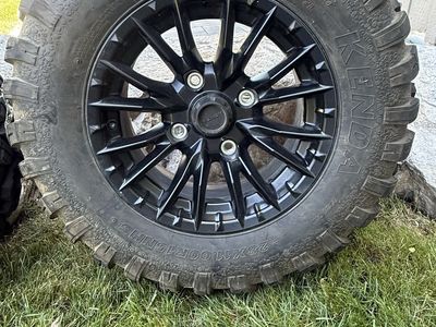 Kendra k3201G 28X9.00R 15 NHS ( 2 tires. ) and Kenda 28X 11.0 0R 15 in HS (2 tires) on Honda four bolt pattern rims