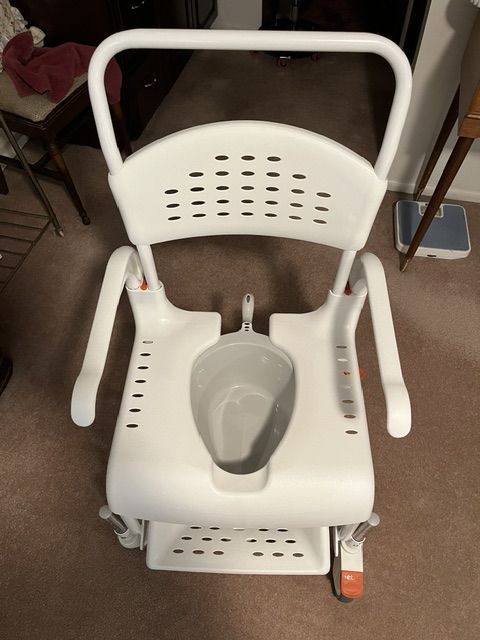 Etac height adjustable portable shower commode chair