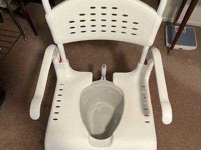 Etac height adjustable portable shower commode chair