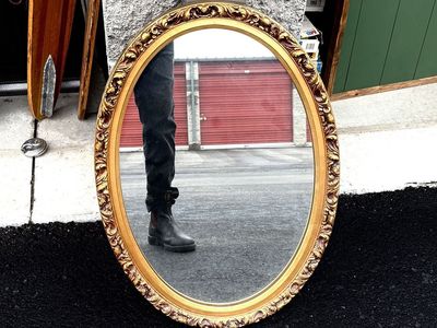 Vintage mirror. Great condition. Oval shape w/ ornate, gilded gold frame. Vanity mirror Hollywood Regency