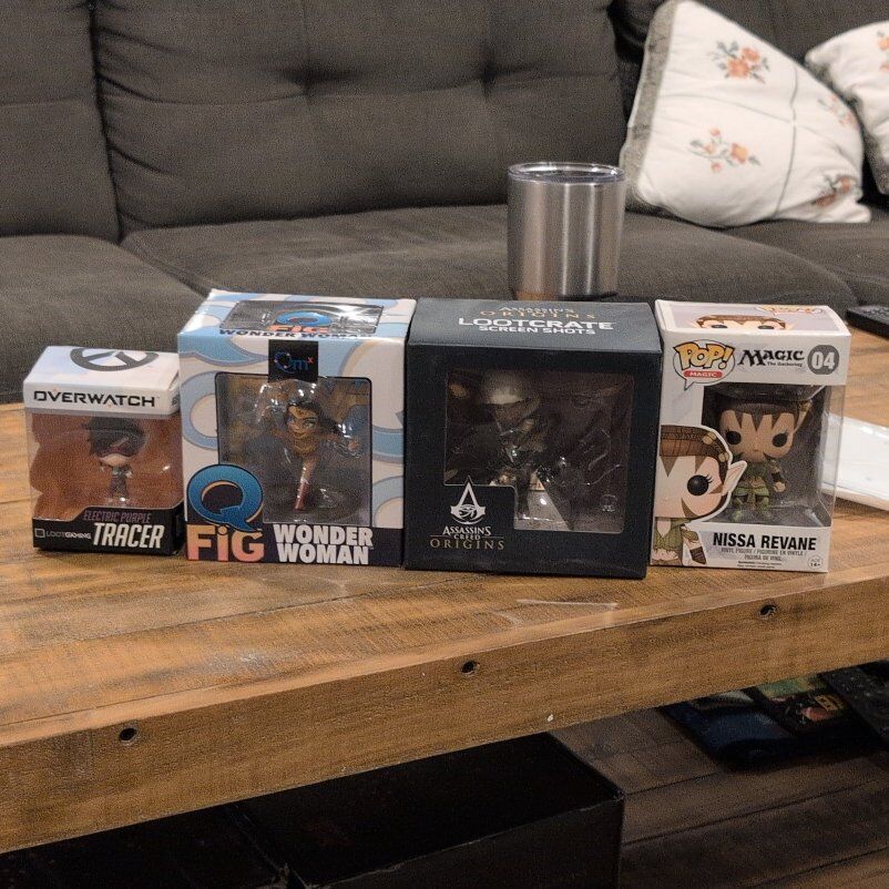 Four Collectible Figurines