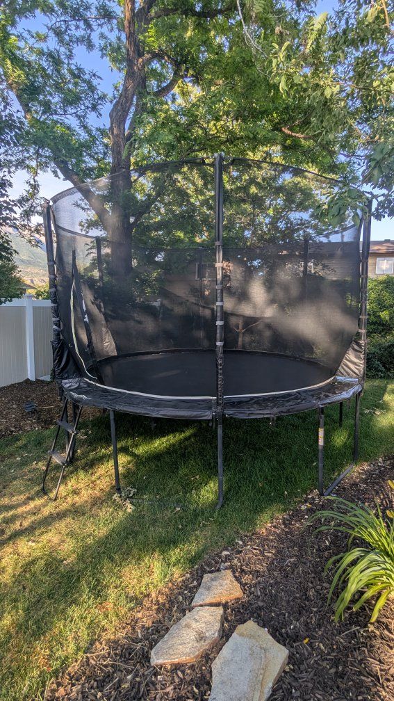 12' Trampoline with Safety Net – $125 OBO