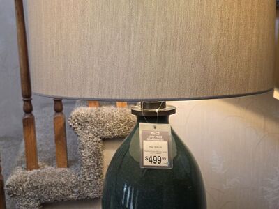Designer-style table lamp with a classic, upscale look