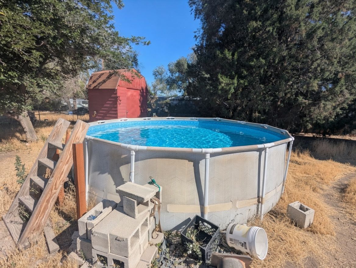 Above ground 16' x 4' pool with pump and ladder, ready for summer fun