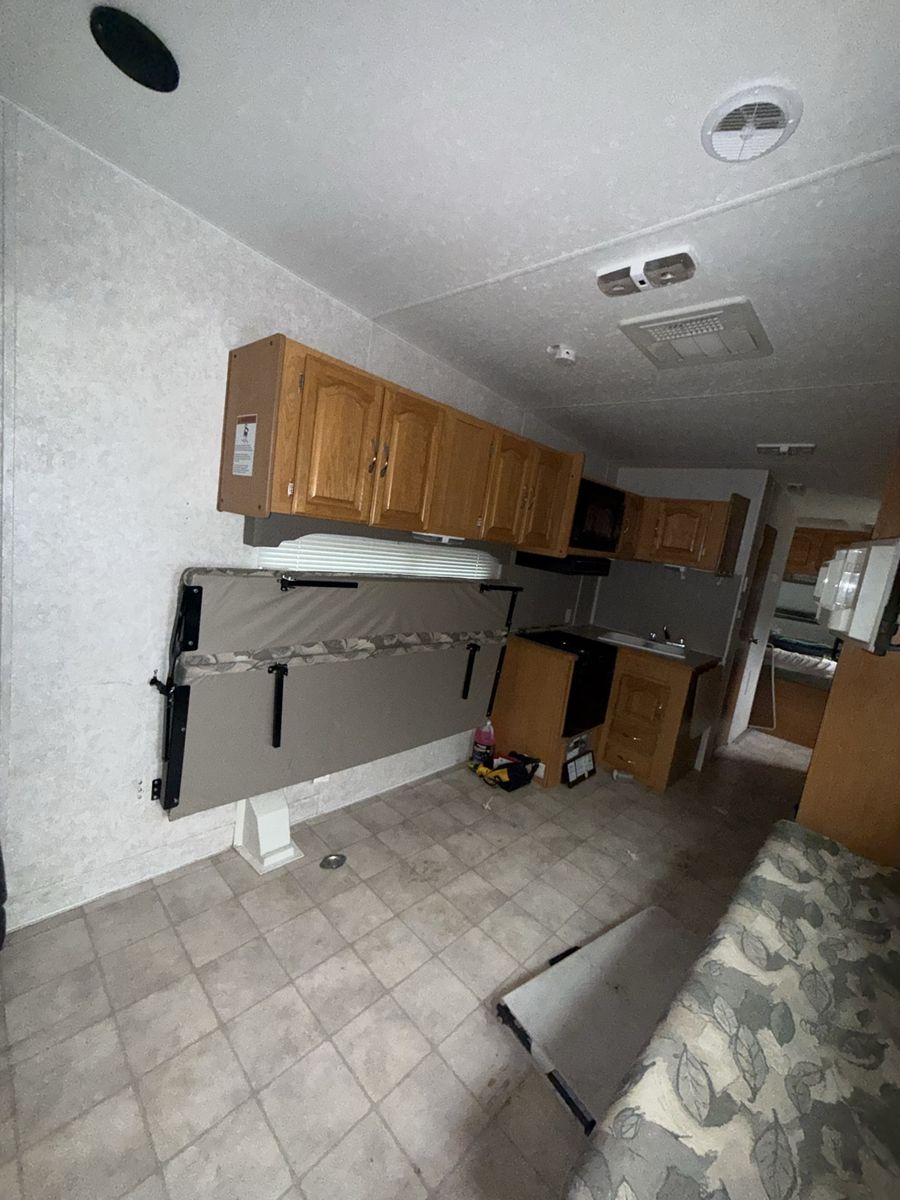 Toy Hauler Travel Trailer with Kitchen, Seating, and Generator