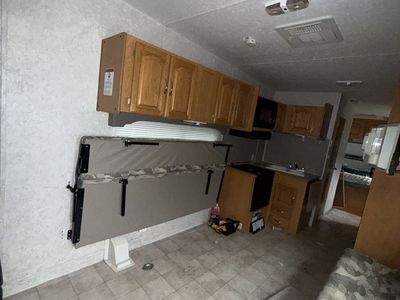 Toy Hauler Travel Trailer with Kitchen, Seating, and Generator