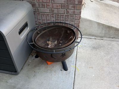 Outdoor Metal Fire Pit with Moon and Star Cutouts - Used Good Condition