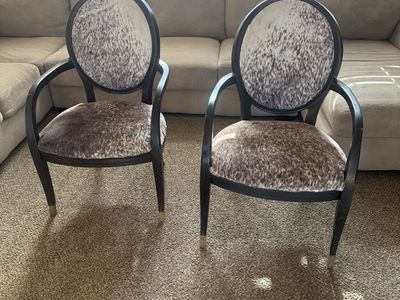 Pair of Cowhide Accent Chairs - Black Wood Frame, Gold Accents