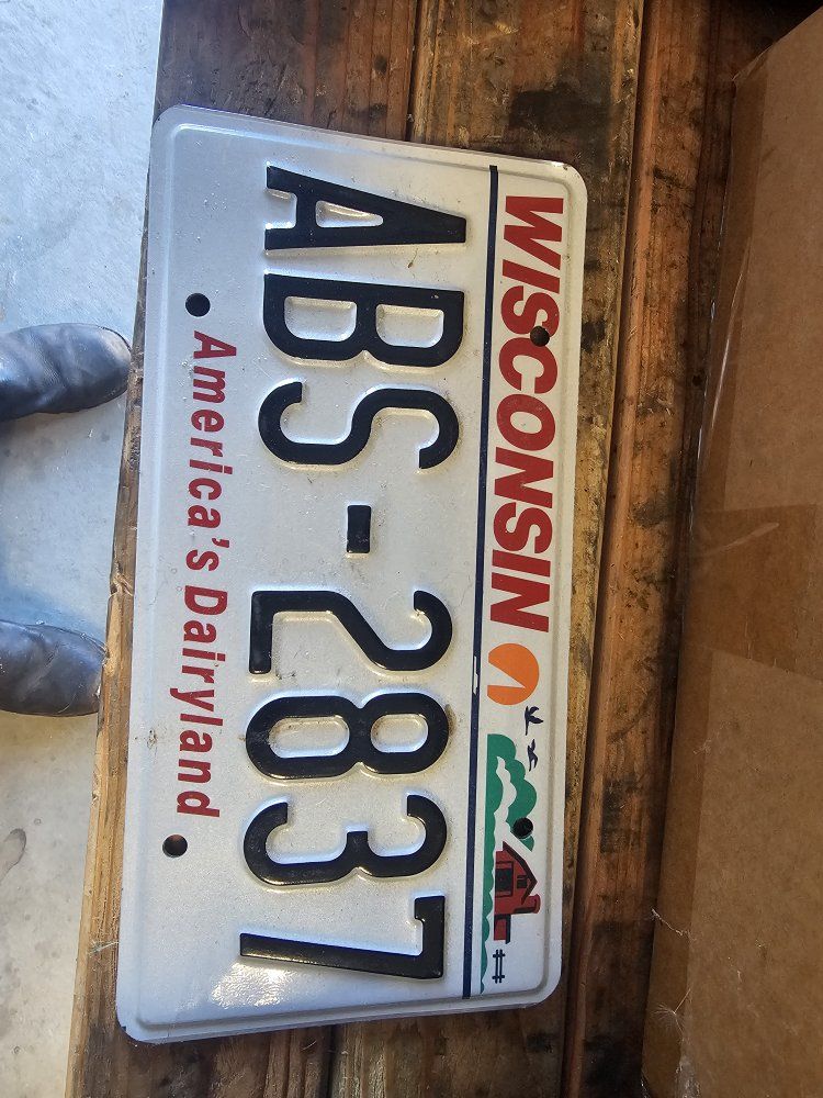 Vintage Wisconsin ABS-2837 "America's Dairyland" License Plate - Collectible Auto Memorabilia