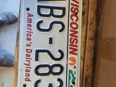 Vintage Wisconsin ABS-2837 "America's Dairyland" License Plate - Collectible Auto Memorabilia