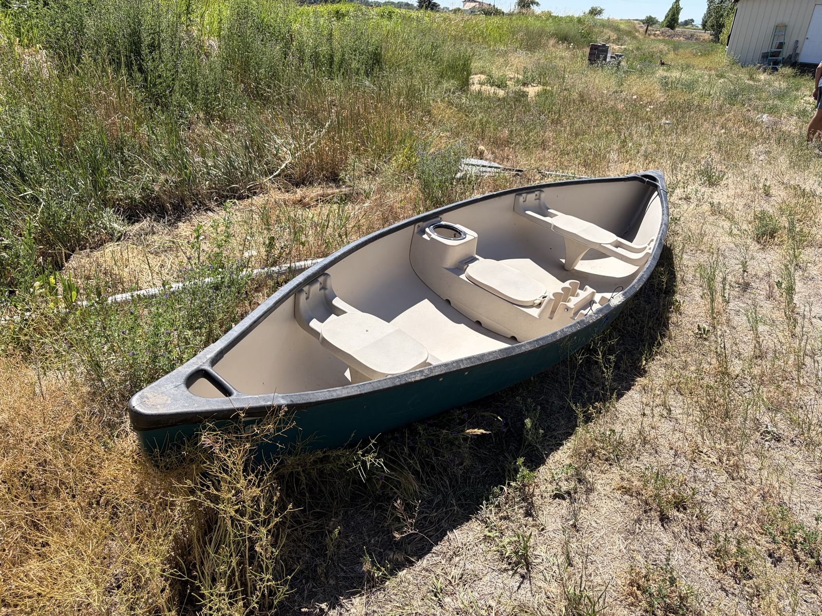 Used Canoe with Seating and Storage - Perfect for Water Sports Adventures