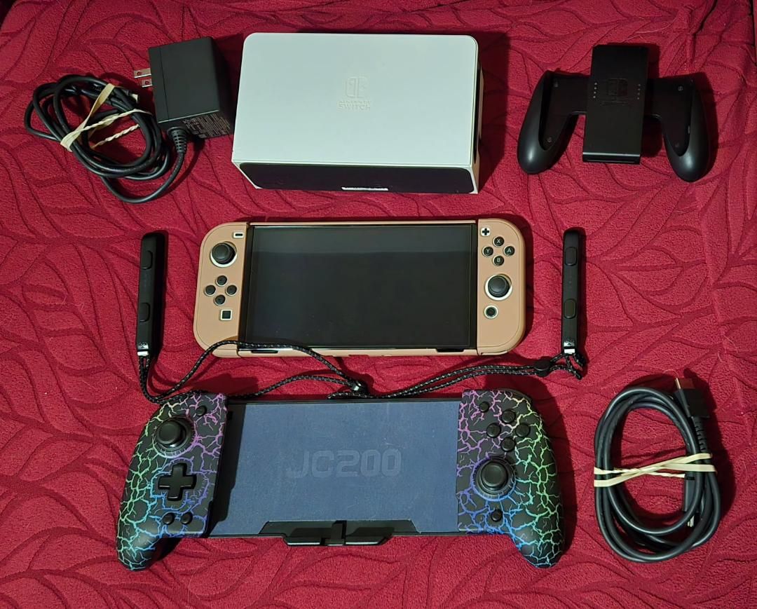 Nintendo Switch Oled with tv dock and Jc200 wireless controller! trades considered!