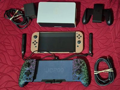 Nintendo Switch Oled with tv dock and Jc200 wireless controller! trades considered!