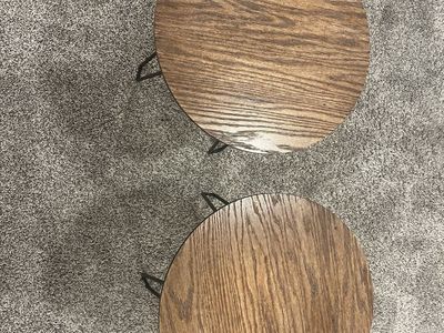 Circular wooden and metal side tables