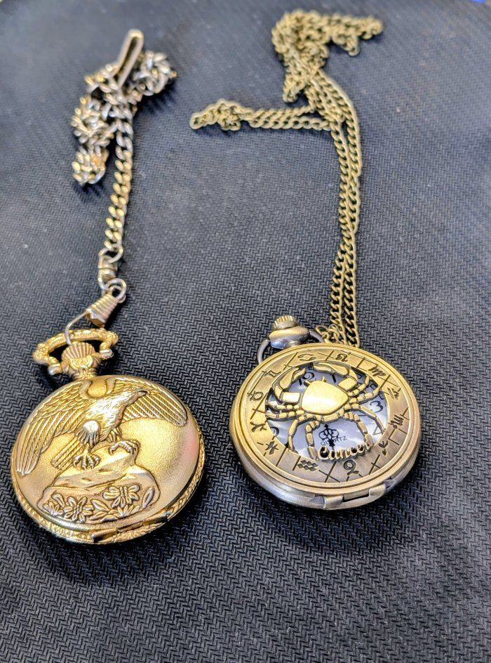 Set of 2 New pocket watches. asking $15 for both