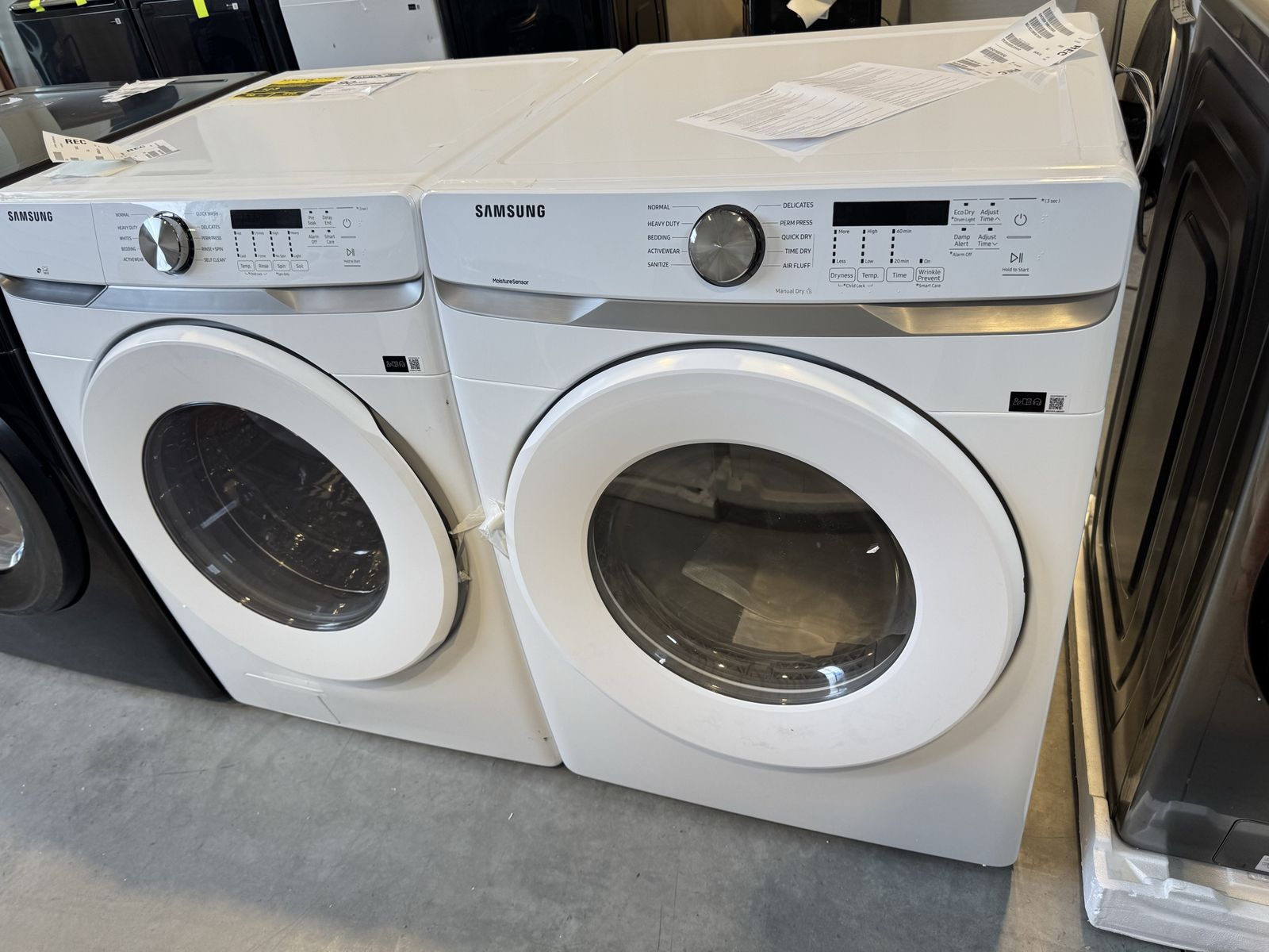 New open box Samsung 4.5 cu. ft. Front Load Washer with Vibration Reduction Technology+ and 7.5 cu. ft. ELECTRIC Dryer