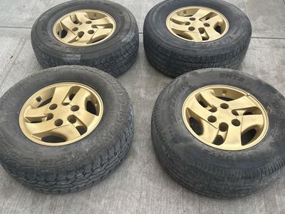 Gold Toyota 6x5.5 Wheels and 265/70/R16 Tires