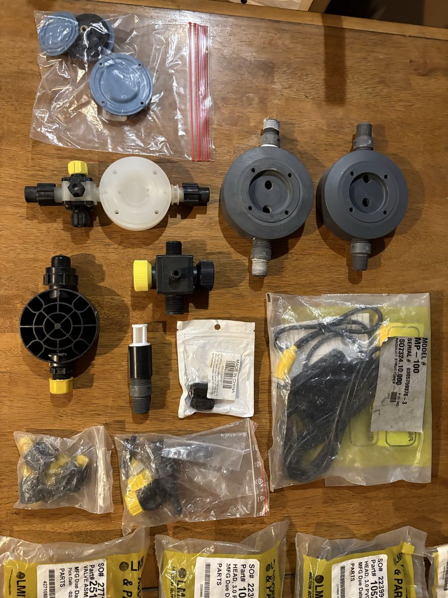 LMI Milton Roy Pump Parts: Head 3.0 PVC (10525), Head 0.9 Molded PVC (37752), Liquifram 0.9 (30917), Valve ASM SUC LE-25