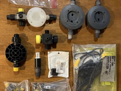 LMI Milton Roy Pump Parts: Head 3.0 PVC (10525), Head 0.9 Molded PVC (37752), Liquifram 0.9 (30917), Valve ASM SUC LE-25