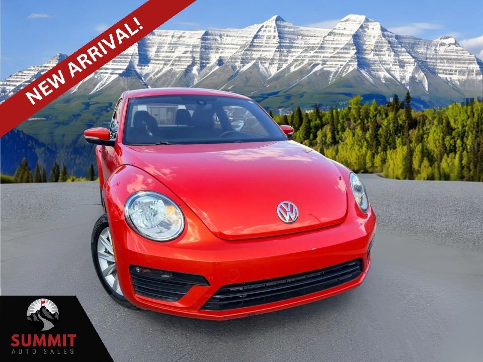 2018 Volkswagen Beetle 2.0T S — rebuilt & branded title, 13% below market